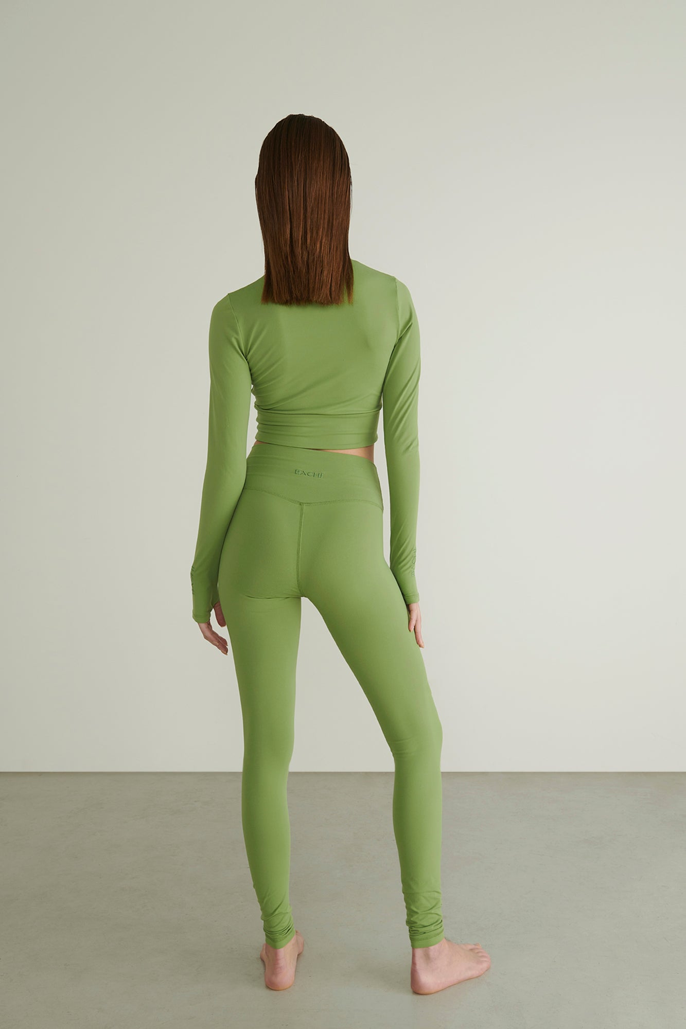 Model Wearing Green Legging and Green Crop Top 