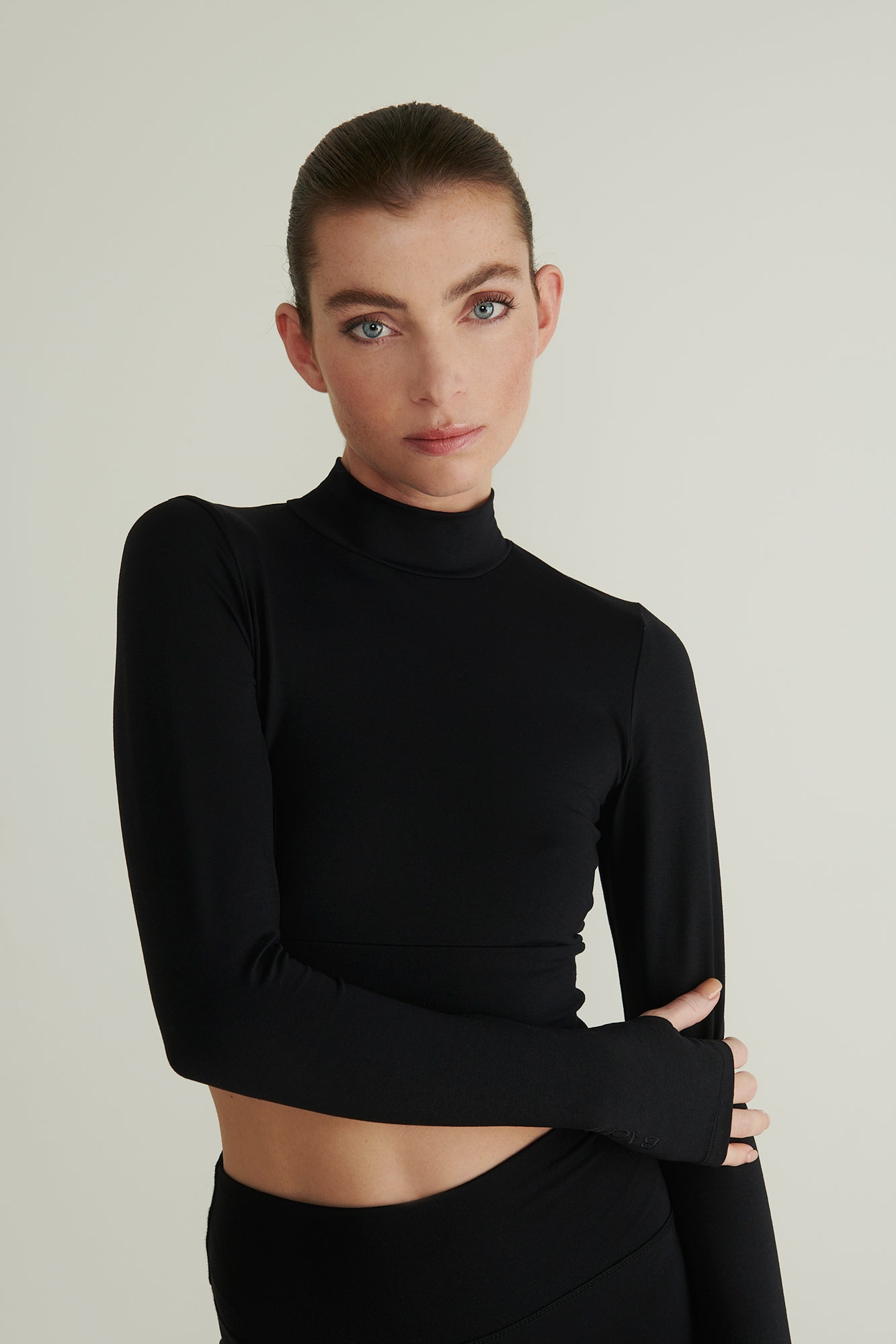 Model Wearing the Black B Sleeve by BACHI